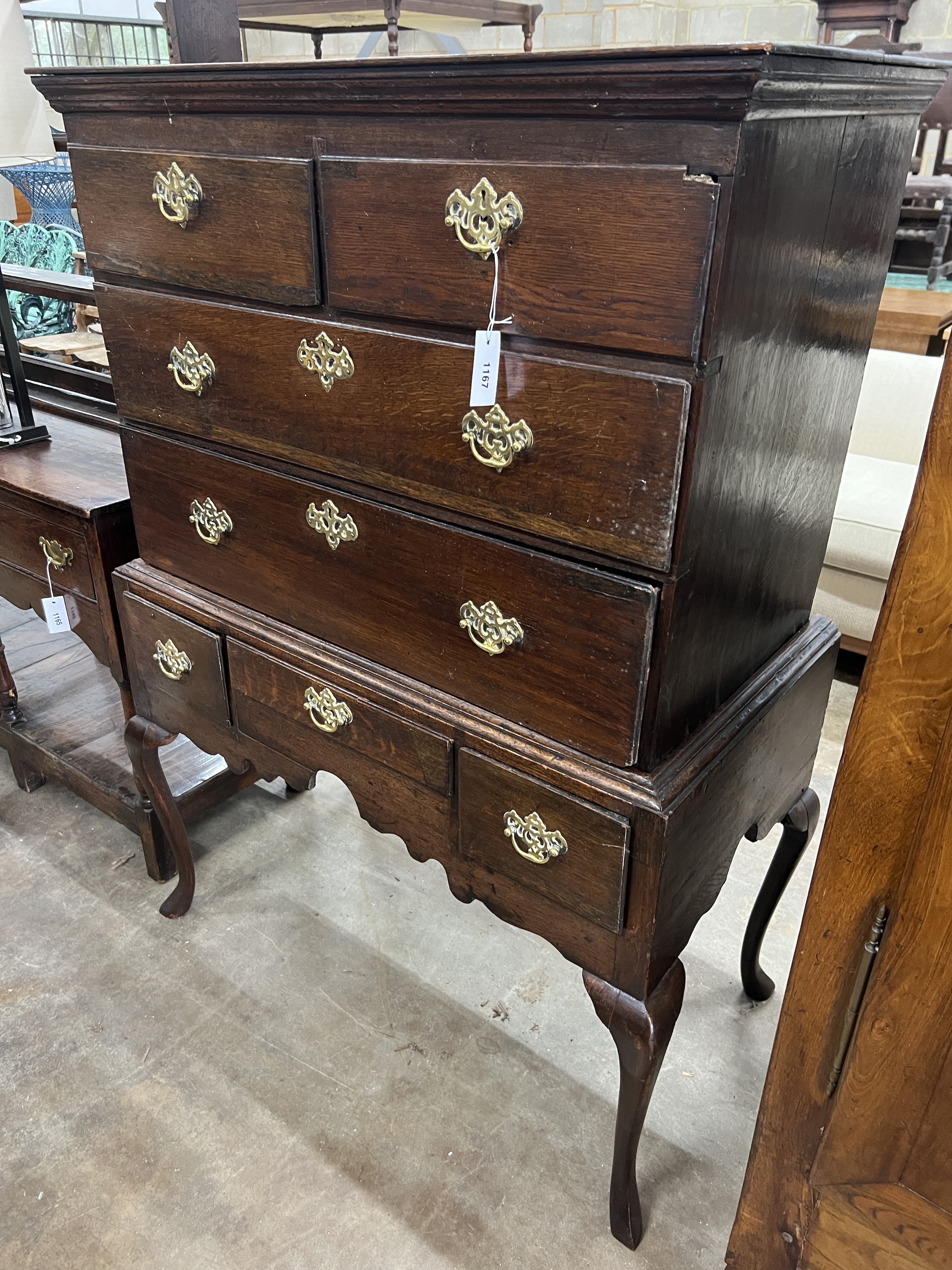 A George III oak chest on stand, width 106cm, depth 58cm, height 144cm